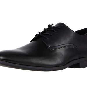 Calvin Klein Lorimer textured leather shoes.